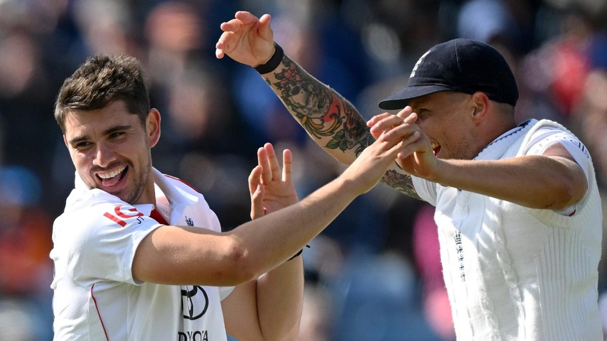 Josh Tongue and Brydon Carse celebrate a wicket during the England-India Test at Headingley
