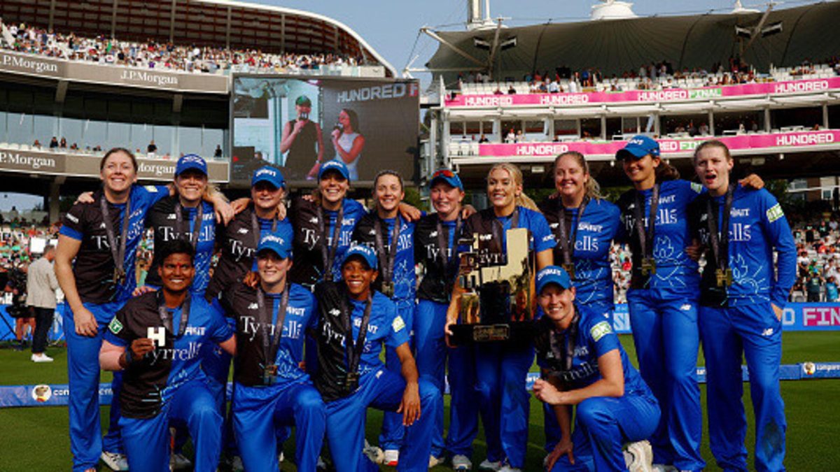 Players of London Spirit pose for a photo with the The Hundred Trophy after defeating Welsh Fire during the The Hundred Final match between Welsh Fire Women and London Spirit Women at Lord's.