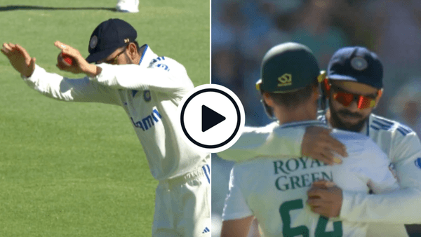 sa-vs-ind-watch-virat-kohli-makes-bowing-gesture-hugs-dean-elgar-after-final-test-innings.Click to read full article.