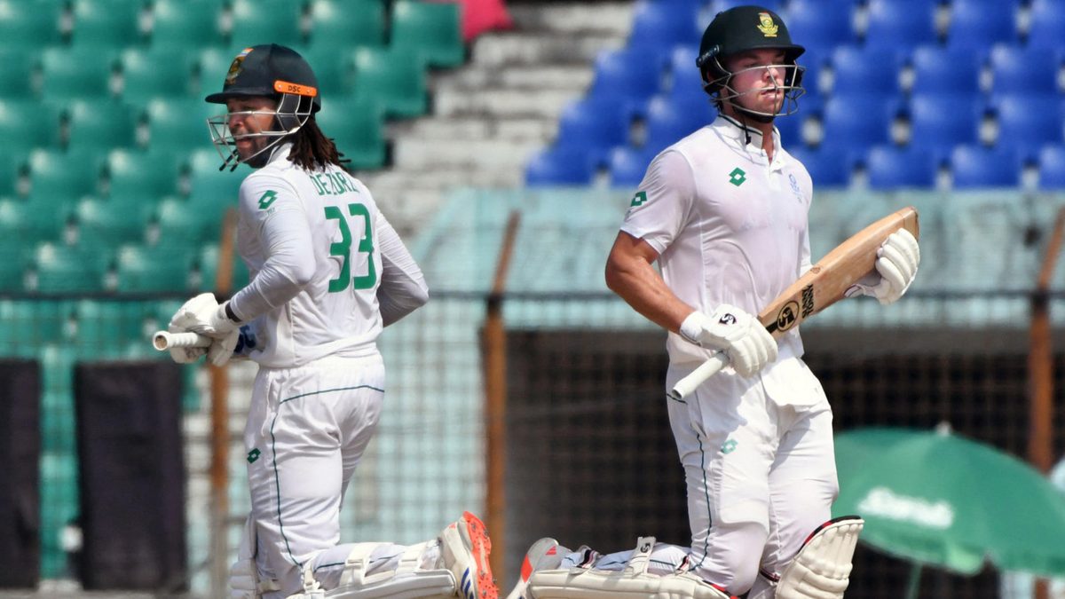 South Africa's Tony De Zorzi and Tristan Stubbs (R) run between the wickets during the first day of the second Test cricket match between Bangladesh and South Africa at the Zahur Ahmed Chowdhury Stadium in Chittagong on October 29, 2024