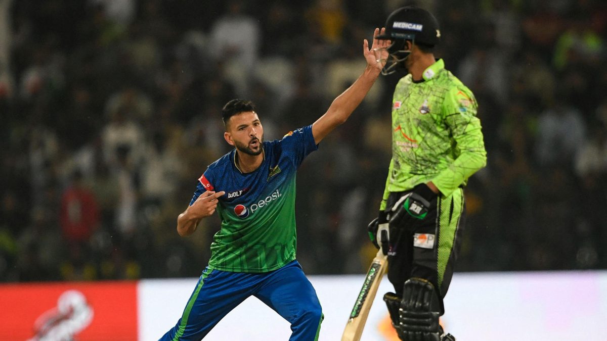 Multan Sultans' Ihsanullah (L) celebrates after the dismissal of Lahore Qalandars' Tahir Baig (R) during Pakistan Super League (PSL) Twenty20 cricket final match between Lahore Qalandars and Multan Sultans at the Gaddafi Cricket Stadium in Lahore on March 18, 2023