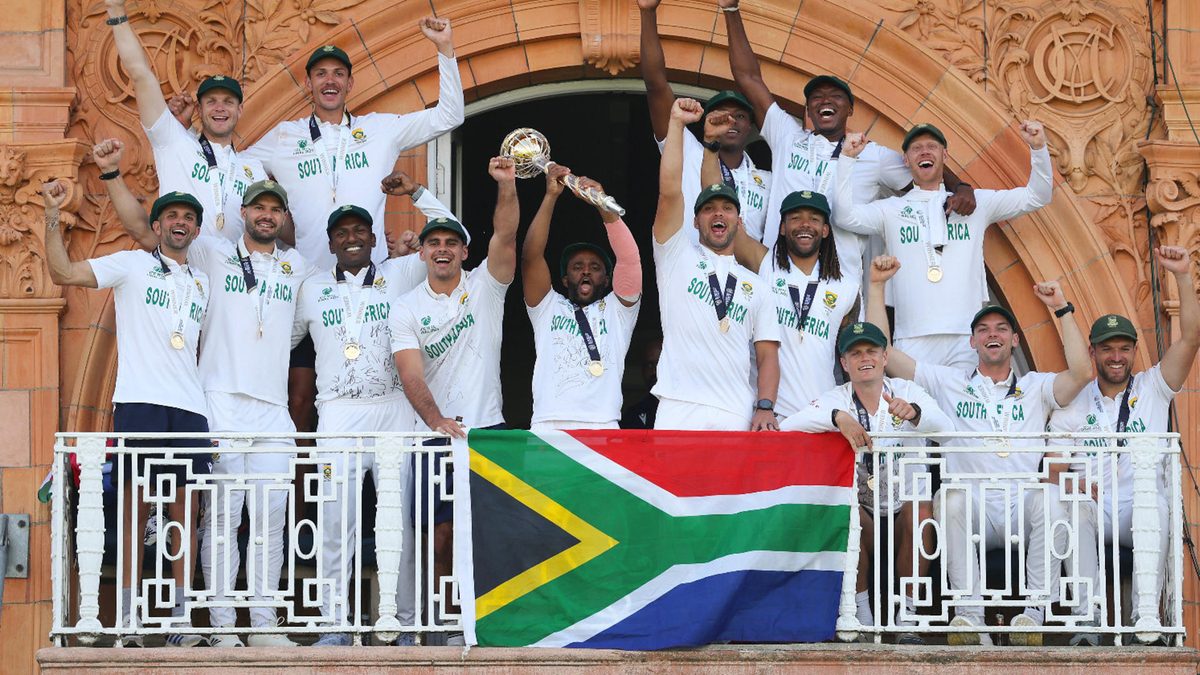 Temba Bavuma of South Africa celebrates on the team balcony with the ICC World Test Championship Mace alongside teammates following the side's victory on during Day Four of the ICC World Test Championship Final 2025 between South Africa and Australia at Lord's Cricket Ground on June 14, 2025 in London, England
