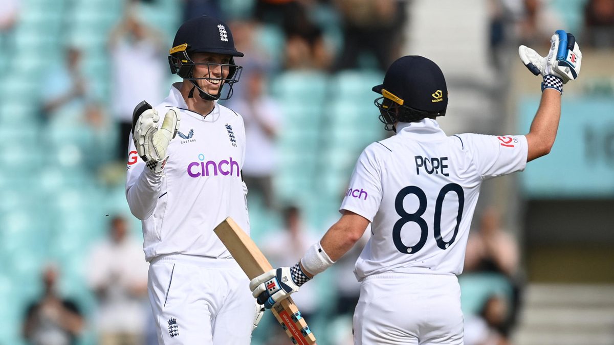 England opening batsman Zak Crawley (l) and Ollie Pope celebrate the winning runs during day five of the Third LV= Insurance Test Match between England and South Africa at The Kia Oval on September 12, 2022 in London, England