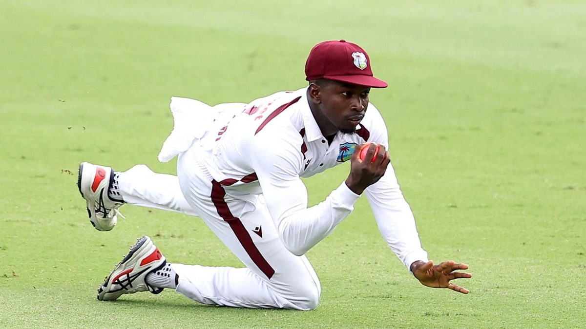 Kevin Sinclair fields ball during a Test match