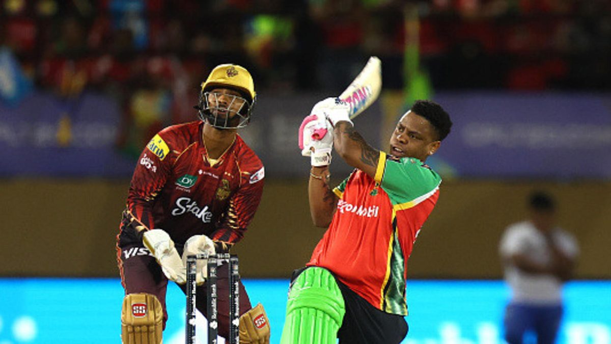 Shimron Hetmyer of Guyana Amazon Warriors hits six runs as Nicholas Pooran of Trinbago Knight Riders keeps wicket during the Men's 2025 Republic Bank Caribbean Premier League match between Guyana Amazon Warriors v Trinbago Knight Riders at Providence Stadium on September 06, 2025 in Georgetown, Guyana