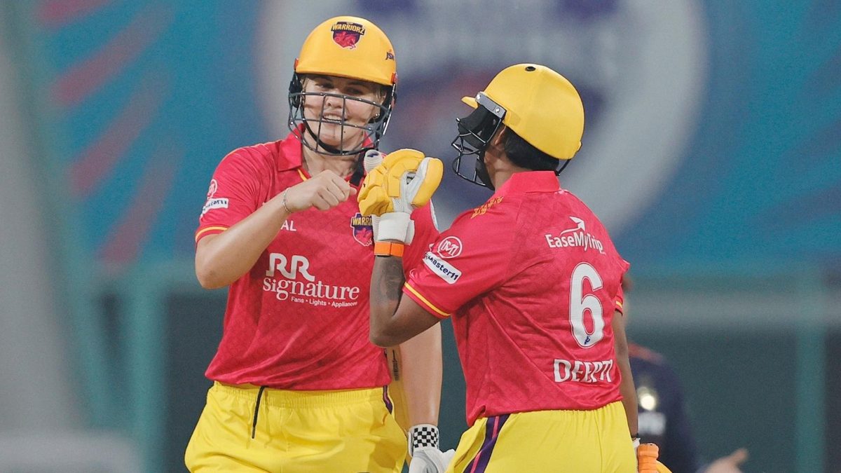 Georgia Voll fist-bumps Deepti Sharma during UP Warriorz highest-ever WPL total