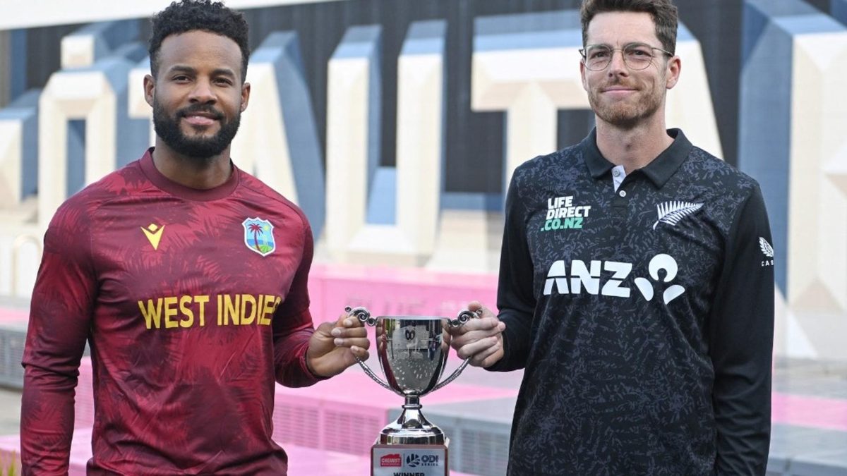 Shai Hope and Mitchell Santner with the ODI trophy