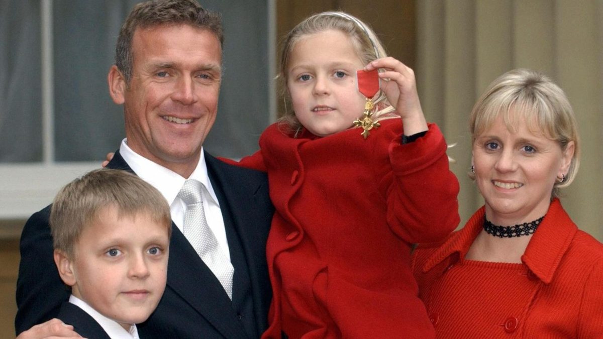 Alec Stewart and his family after receiving his OBE