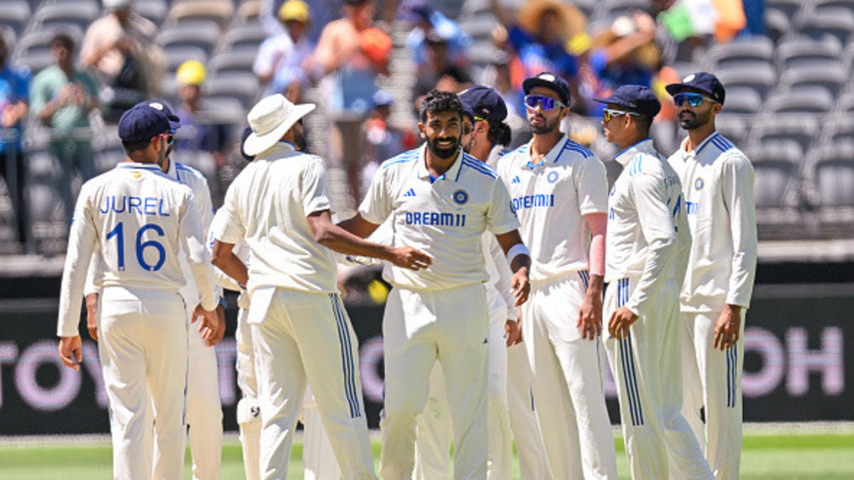 Jasprit Bumrah of India celebrates with teammates after the wicket of Alex Carey of Australia during day two of the First Test match in the series between Australia and India at Perth Stadium on November 23, 2024 in Perth, Australia