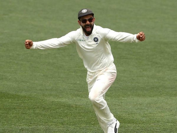 kohli-perth-green-top.Click to read full article.