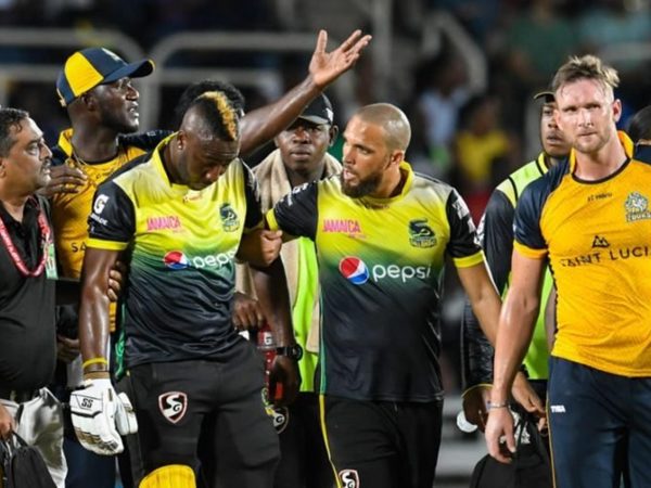 andre-russell-stretched-hit-helmet-cleared-danger.Click to read full article.