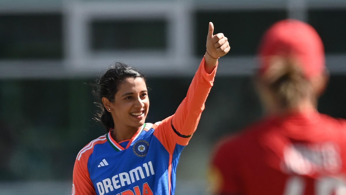mriti Mandhana of India gestures after reaching her century during the 1st Women's Vitality IT20 between England and India at Trent Bridge on June 28, 2025 in Nottingham, England