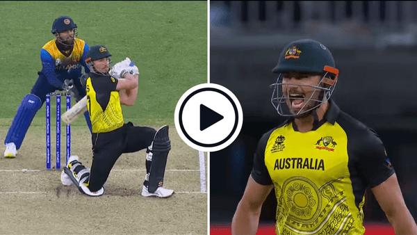 watch-marcus-stoinis-smashes-wanindu-hasaranga-for-101-metre-six-in-record-breaking-t20-world-cup-fifty.Click to read full article.
