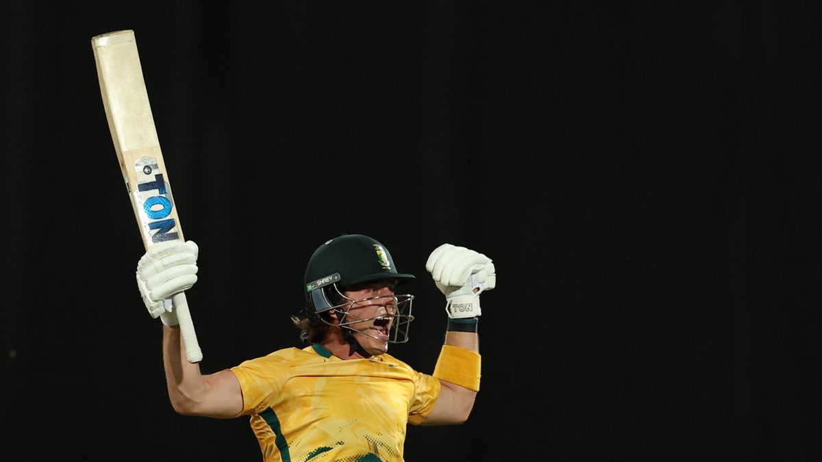 Dewald Brevis of South Africa celebrates after reaching his century during game two in the T20 International series between Australia and South Africa at Marrara Stadium on August 12, 2025 in Darwin, Australia