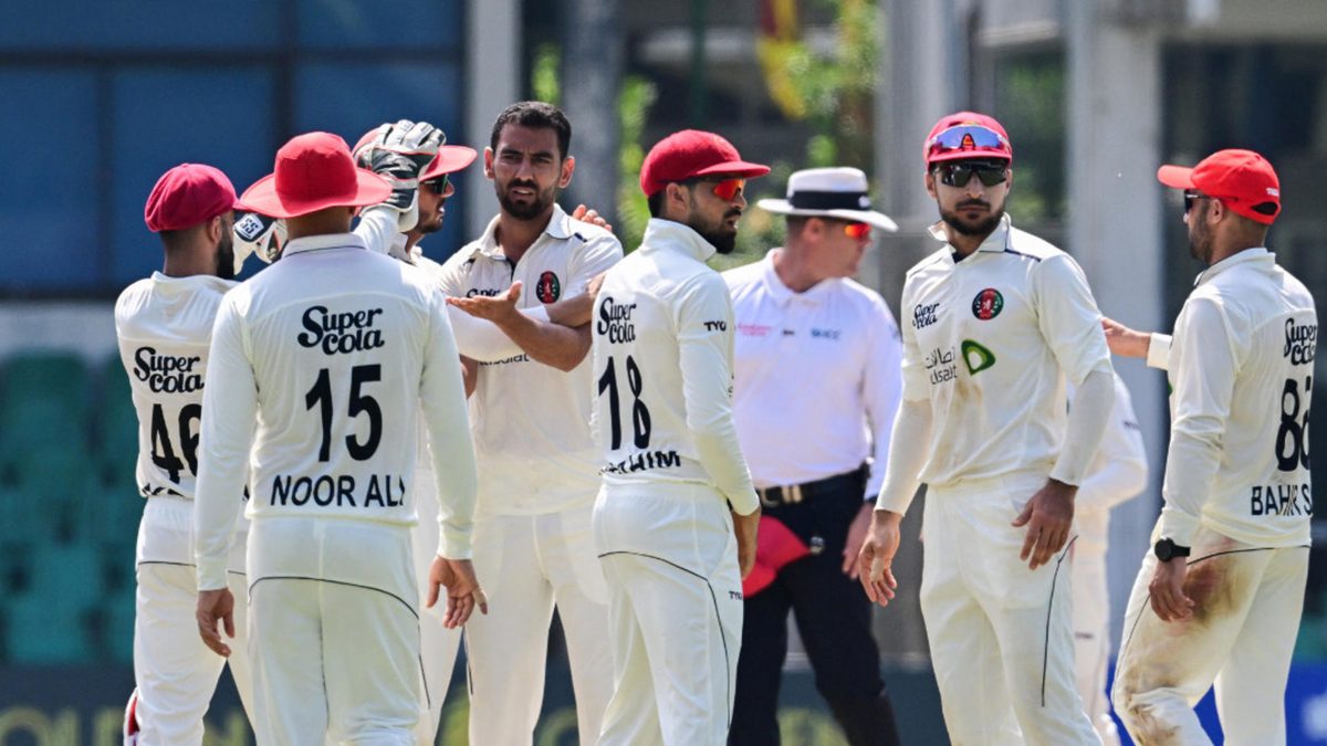 Afghanistan's Nijat Masood (C) celebrates with teammates after taking the wicket of Sri Lanka's Asitha Fernando during the third day of the one-off Test cricket match between Sri Lanka and Afghanistan at the Sinhalese Sports Club (SSC) in Colombo on February 4, 2024