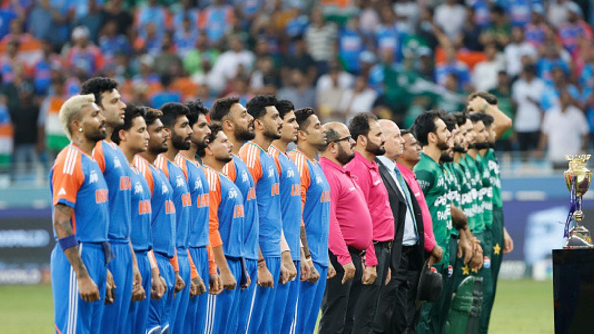 India and Pakistan players stand at national anthem during the match between India and Pakistan at Dubai International Stadium on September 21, 2025 in Dubai, United Arab Emirates
