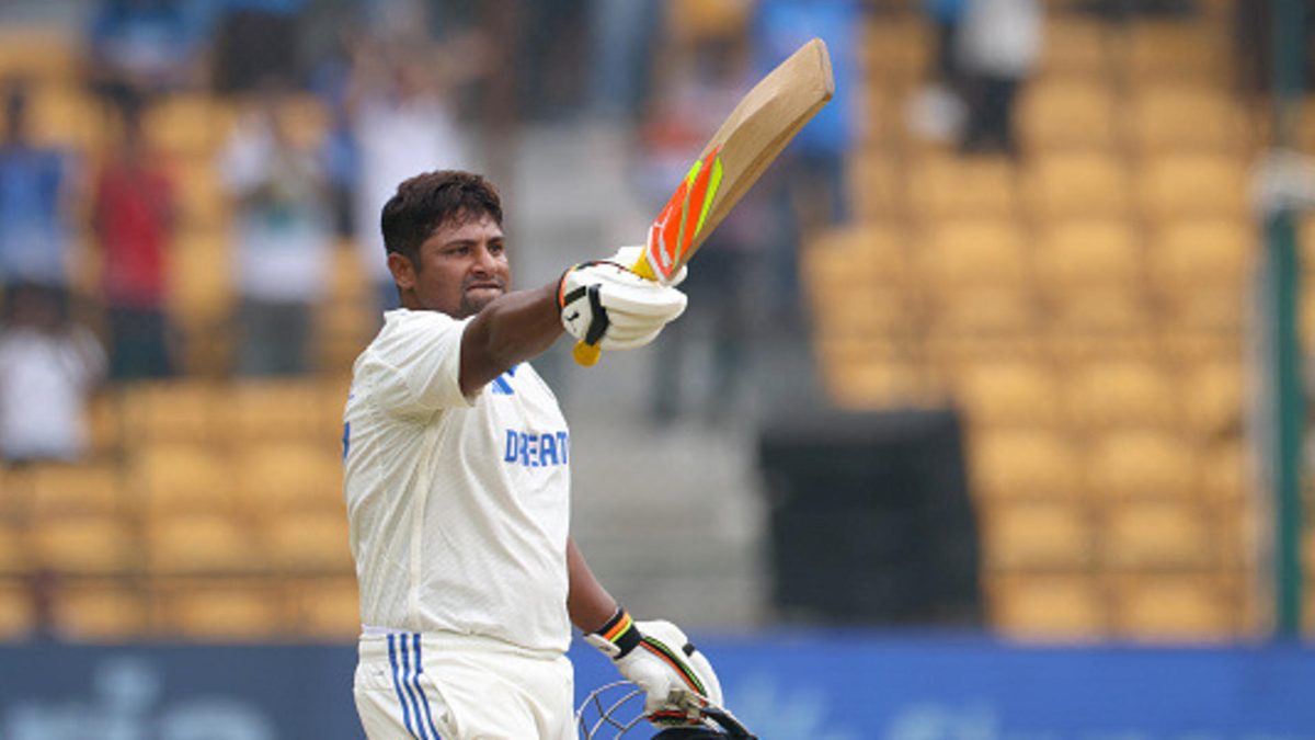 Sarfaraz Khan of India celebrates scoring a century during day four of the First Test match between India and New Zealand at M. Chinnaswamy Stadium on October 19, 2024 in Bengaluru, India
