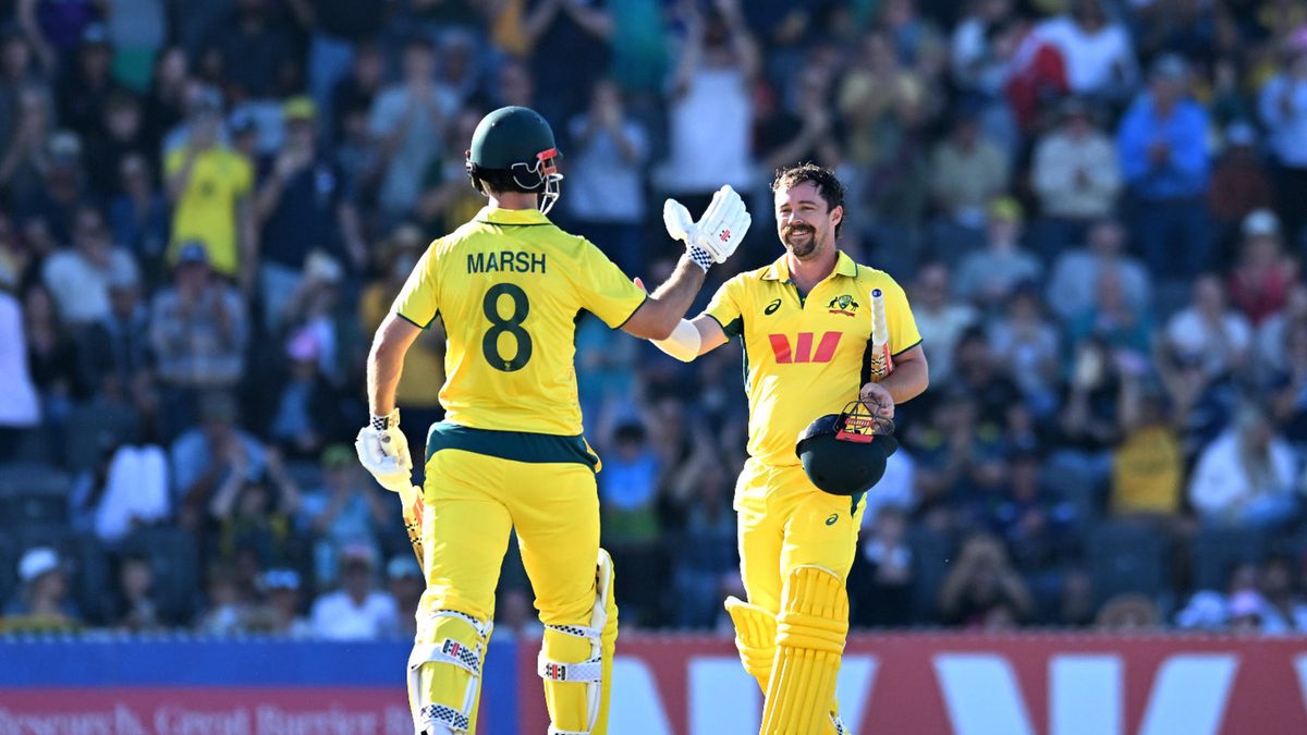 Travis Head of Australia celebrates with Mitchell Marsh his century during game three of the One Day International Series between Australia and South Africa at Great Barrier Reef Arena on August 24, 2025 in Mackay, Australia