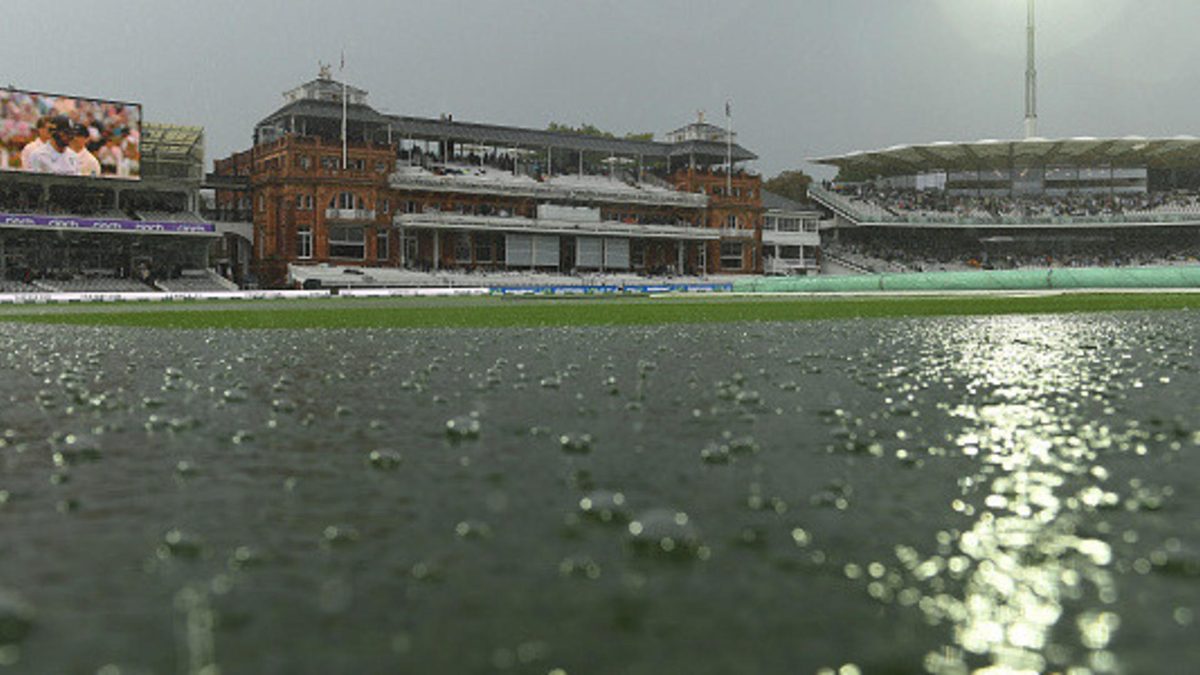 A large puddle on the ground after rain stopped play during the first Test between England and South Africa at Lord's Cricket Ground on August 17, 2022 in London, England