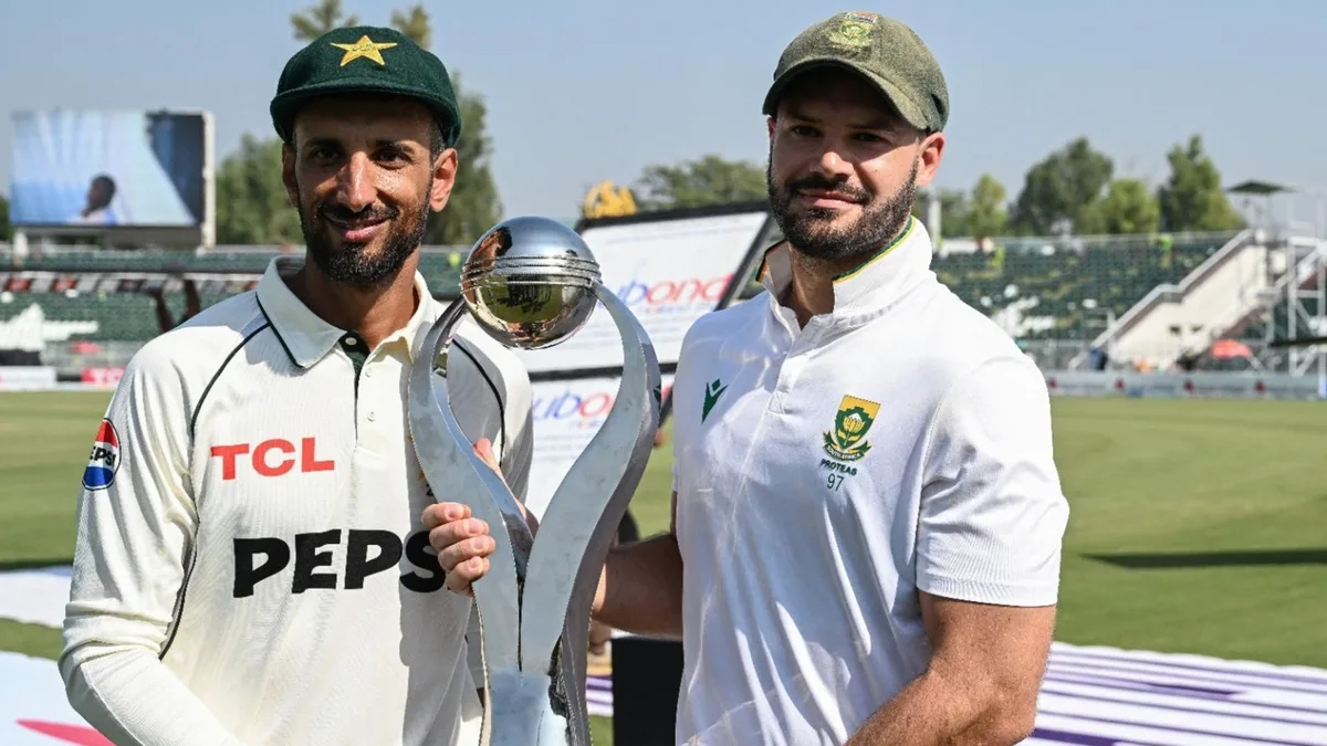 Shan Masood and Aiden Markram posed with shared Test series trophy