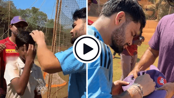 watch-rinku-gifts-a-signed-cap-to-a-ball-kid-he-accidentally-hit-during-training-india-cricket-news-ipl-2024-kolkata-knight-riders.Click to read full article.