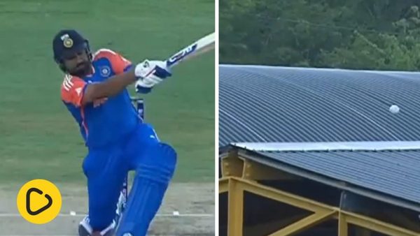 watch-rohit-sharma-slog-sweeps-pat-cummins-onto-stadium-roof-for-100m-six.Click to read full article.