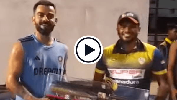 watch-sri-lanka-net-bowler-gifts-silver-bat-to-virat-kohli-wishes-him-luck-for-100-international-centuries.Click to read full article.