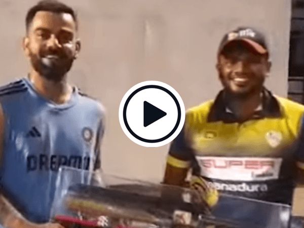 watch-sri-lanka-net-bowler-gifts-silver-bat-to-virat-kohli-wishes-him-luck-for-100-international-centuries.Click to read full article.