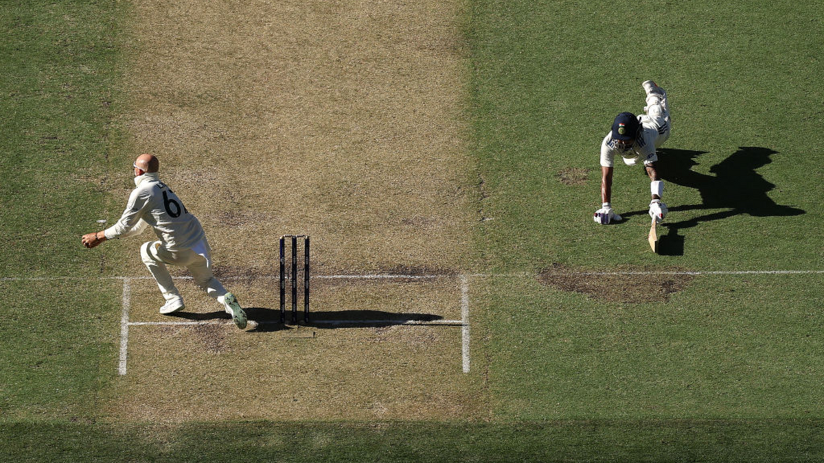 Rahul dives desperately to make his ground