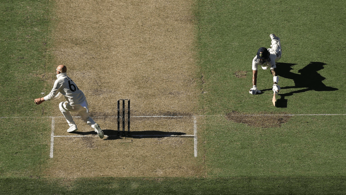 Rahul dives desperately to make his ground