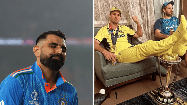 mohammad-shami-hurt-mitch-marsh-putting-feet-world-cup-trophy.Click to read full article.