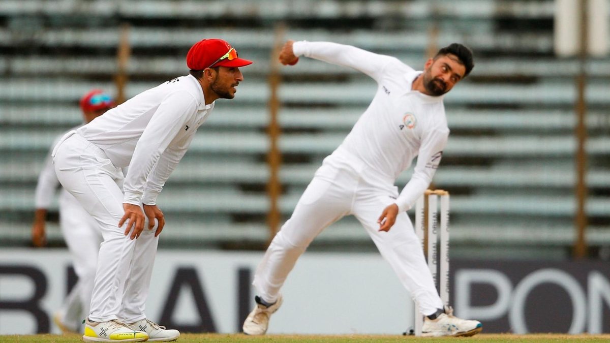 Rashid Khan bowls in Test match