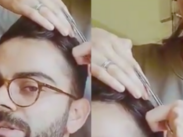 kohli-gets-a-home-haircut-with-kitchen-scissors.Click to read full article.