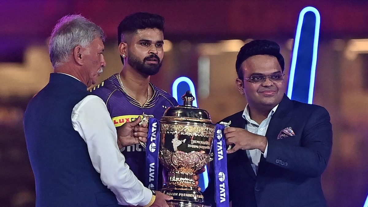 Shreyas Iyer receives the 2024 IPL trophy from Jay Shah