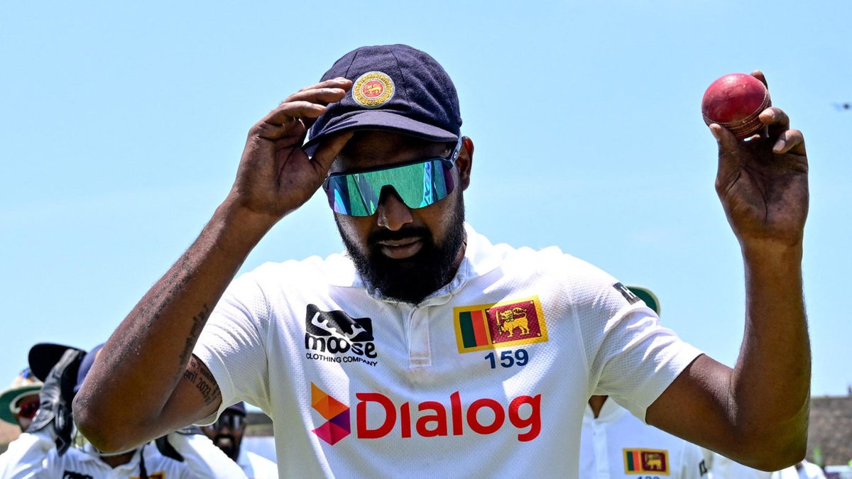 Sri Lanka's Prabath Jayasuriya celebrates after taking five-wicket haul during the third day of the second Test cricket match between Sri Lanka and New Zealand at Galle