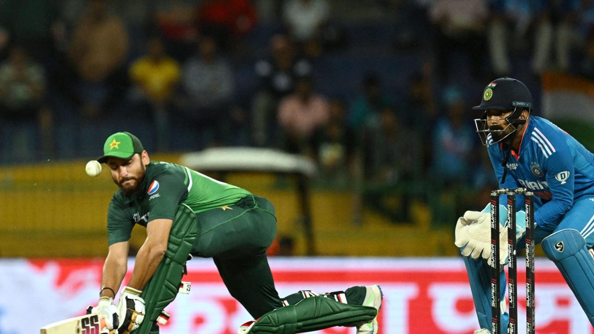 Pakistan's Agha Salman (L) attempts a paddle shot from the bowling of India's Ravindra Jadeja during the Asia Cup 2023 super four one-day international (ODI) cricket match between India and Pakistan at the R. Premadasa Stadium in Colombo on September 11, 2023