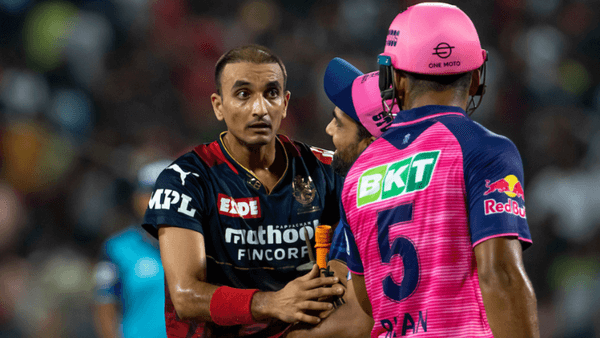 harshal-patel-dragged-away-from-riyan-parag-after-heated-exchange-of-words.Click to read full article.