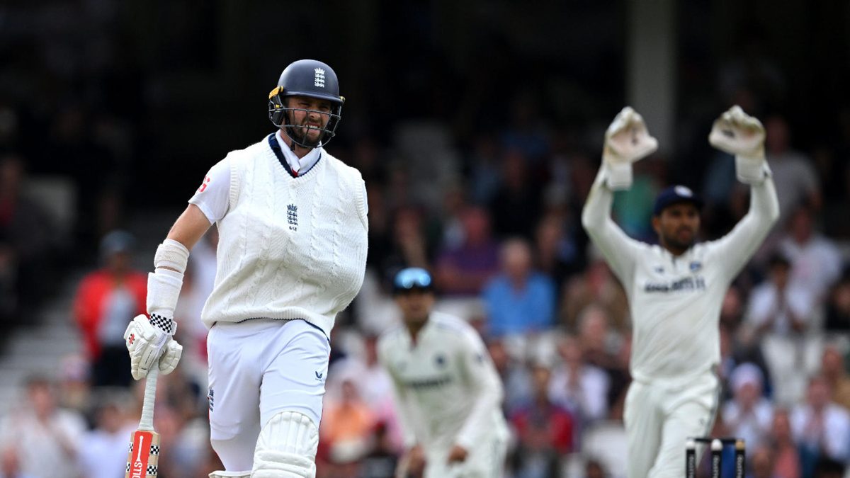 Chris Woakes of England grimaces after making a run as he bats with his arm in a sling on day five of the 5th Rothesay Test Match at The Kia Oval on August 04, 2025 in London, England