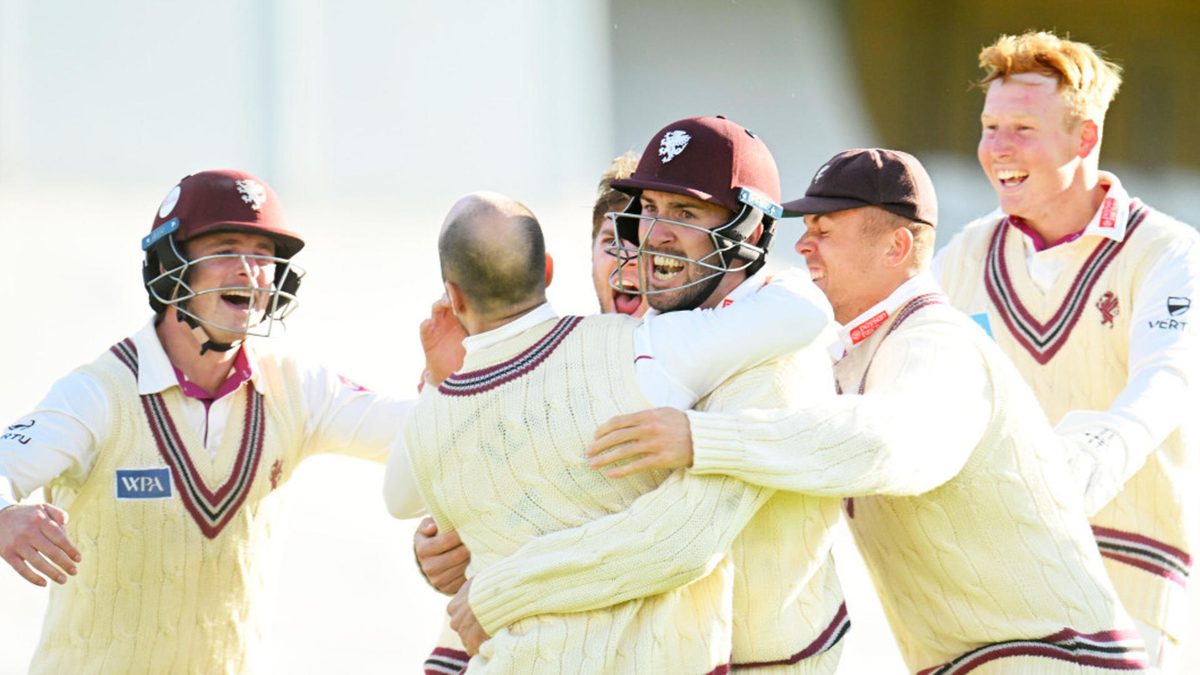 Jack Leach of Somerset celebrates the wicket of Dan Worrall of Surrey with team mates to win the match during Day Four of the Vitality County Championship Division One match between Somerset and Surrey at The Cooper Associates County Ground