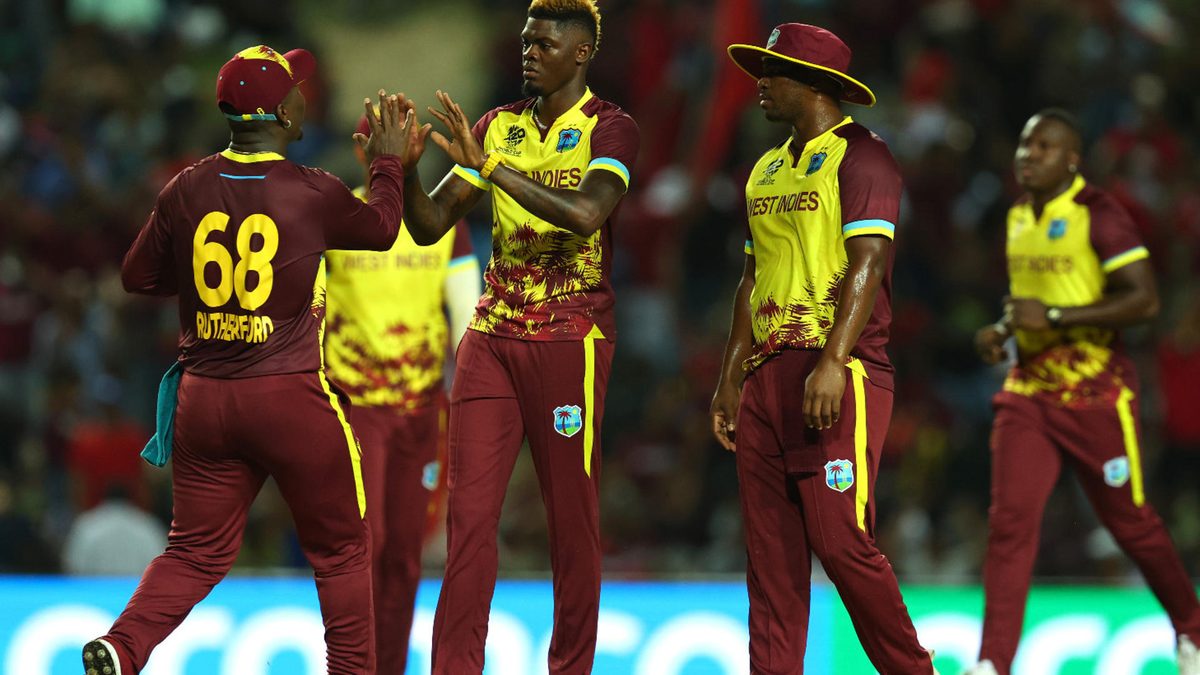 West Indies players celebrate a wicket during the ICC Men's T20 Cricket World Cup West Indies & USA 2024 match between West Indies and New Zealand at Brian Lara Cricket Academy on June 12, 2024 in Tarouba, Trinidad And Tobago.