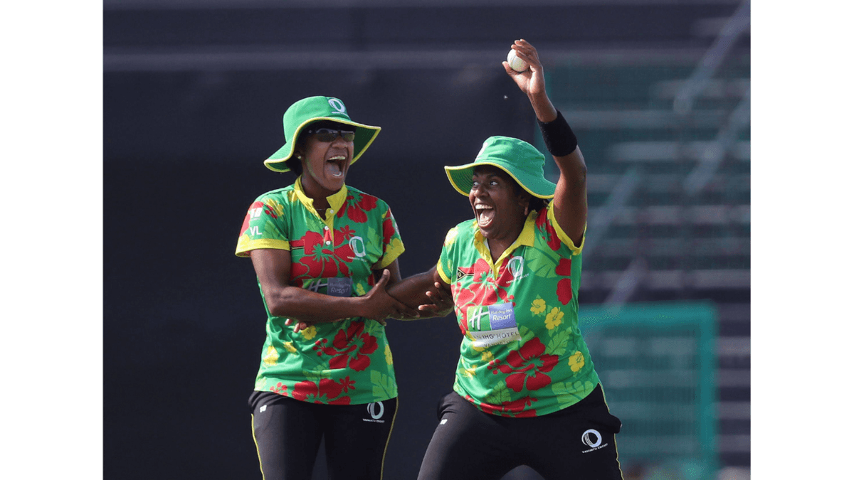Rachel Andrew of Vanuatu celebrates the dismissal of Kavisha Egodage in a T20 World Cup Qualifier against the United Arab Emirates played at Abu Dhabi on May 3. Andrew's team-mate is Valenta Langiatu.