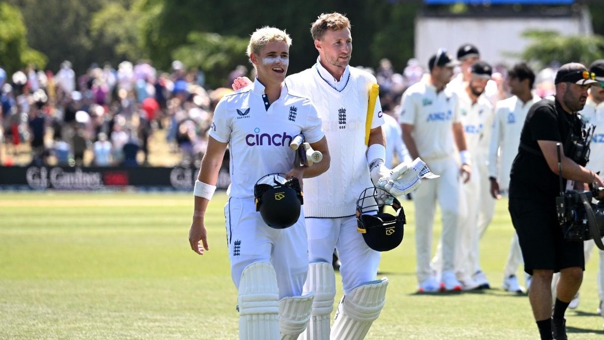 Jacob Bethell walks off the field in Christchurch with Joe Root after scoring his maiden Test half-century
