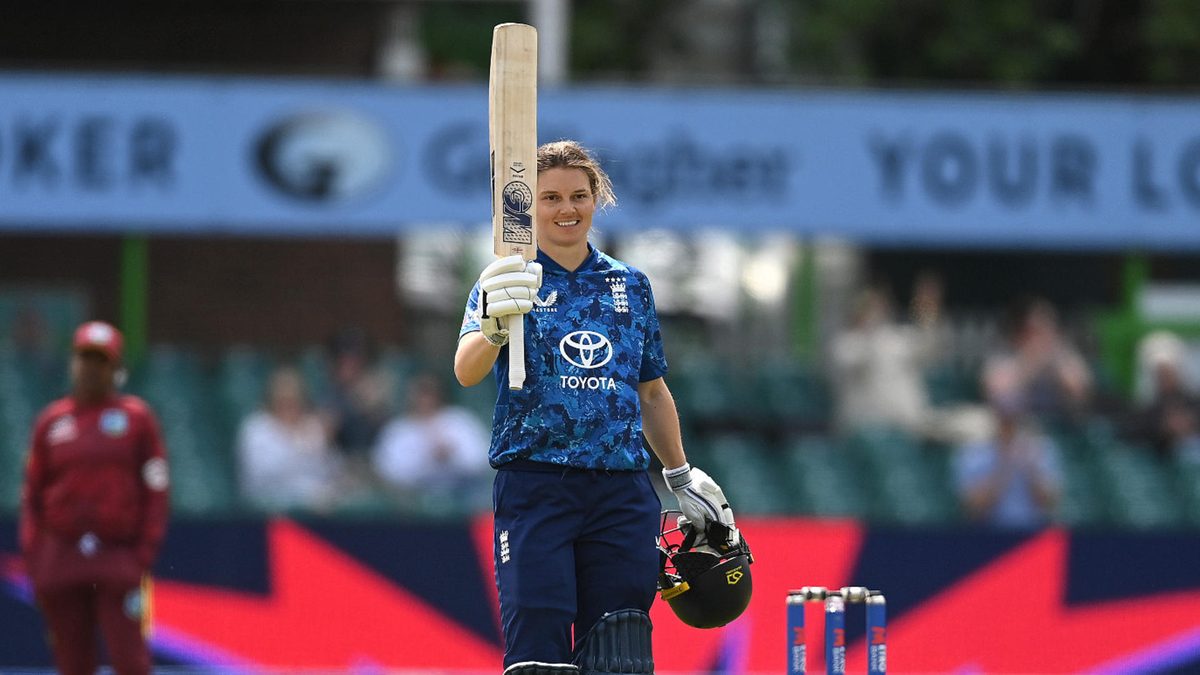 Amy Jones of England celebrates her century during the 2nd Women's Metro Bank ODI between England v West Indies at Uptonsteel County Ground on June 04, 2025 in Leicester, England