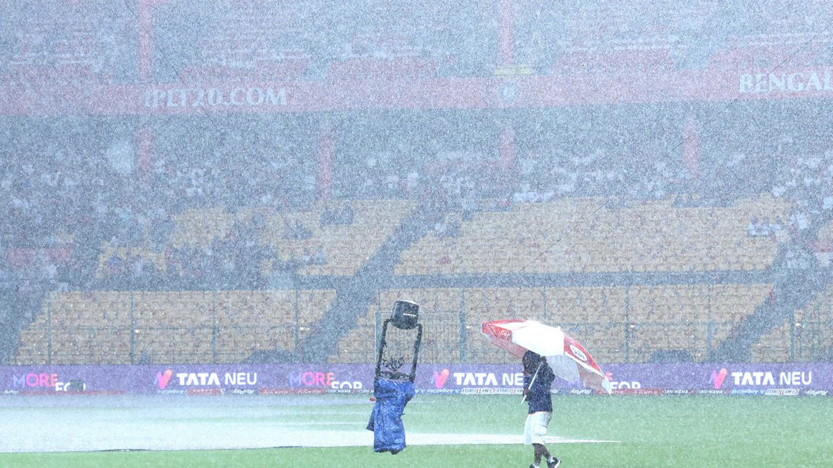General view of the ground as toss is delayed due to rain prior to the 2025 IPL match between Royal Challengers Bengaluru and Kolkata Knight Riders at M Chinnaswamy Stadium on May 17, 2025, in Bengaluru, India