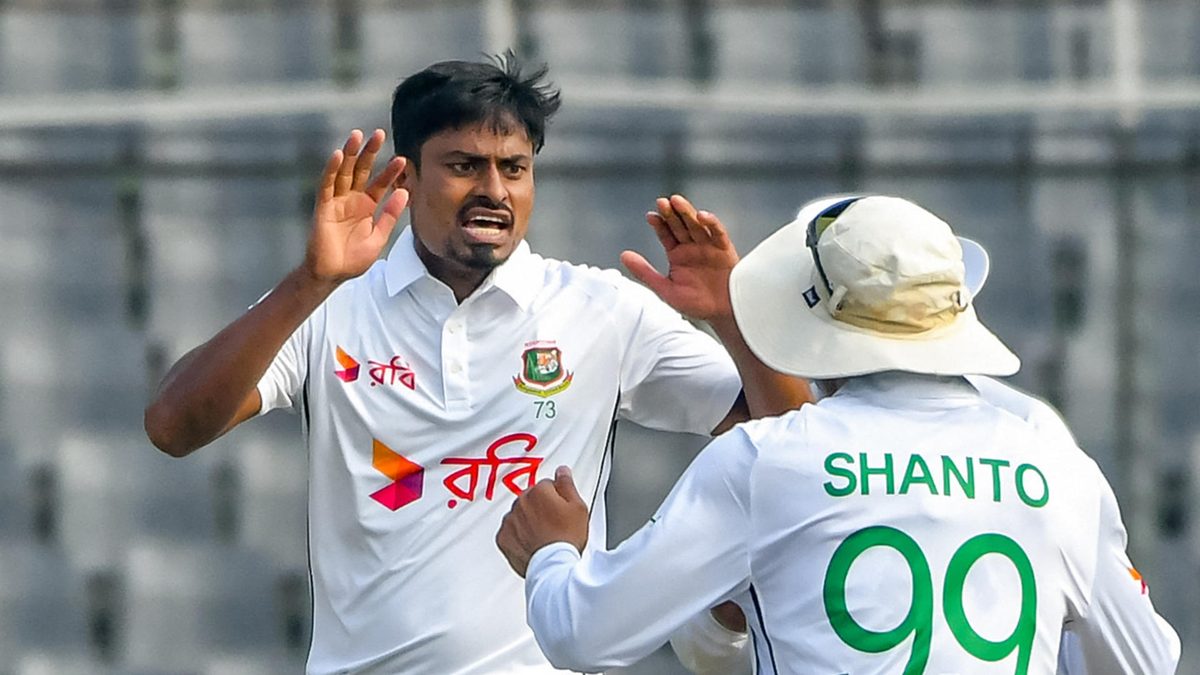 Bangladesh's Taijul Islam (L) celebrates with captain Najmul Hossain Shanto after taking the wicket of South Africa's Tristan Stubbs during the first day of the first Test cricket match between Bangladesh and South Africa at the Sher-e-Bangla National Cricket Stadium in Dhaka on October 21, 2024