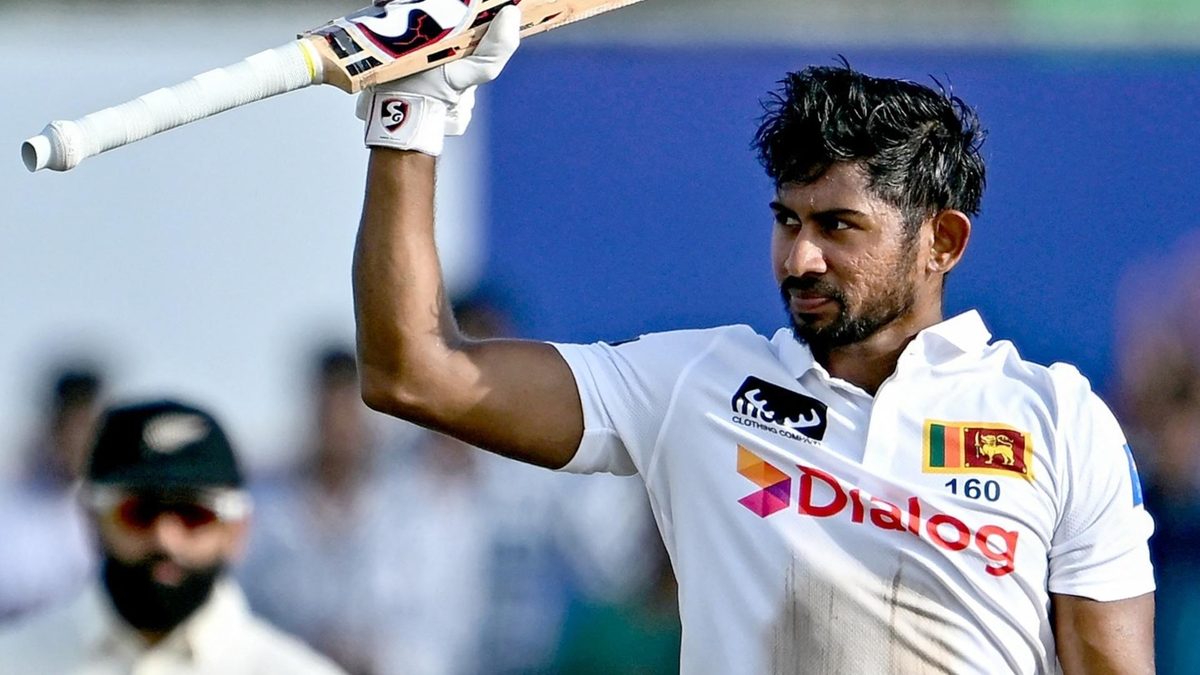 Kamindu Mendis celebrates scoring a century against New Zealand