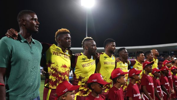 injured-jason-holder-joins-west-indies-team-in-casual-wear-for-pre-match-anthem-wi-vs-usa.Click to read full article.