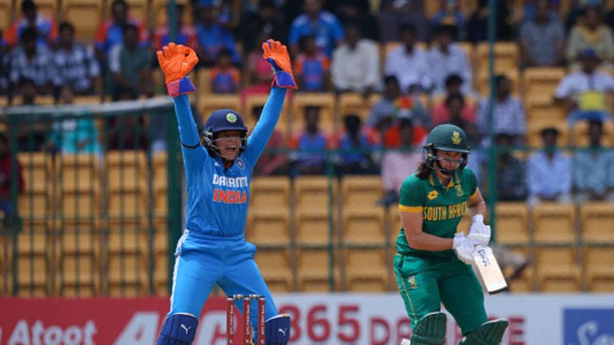 Richa Ghosh of India unsuccessfully appeals for the wicket of Tazmin Brits of South Africa during game three of the ODI series between India and South Africa at M. Chinnaswamy Stadium on June 23, 2024 in Bengaluru, India