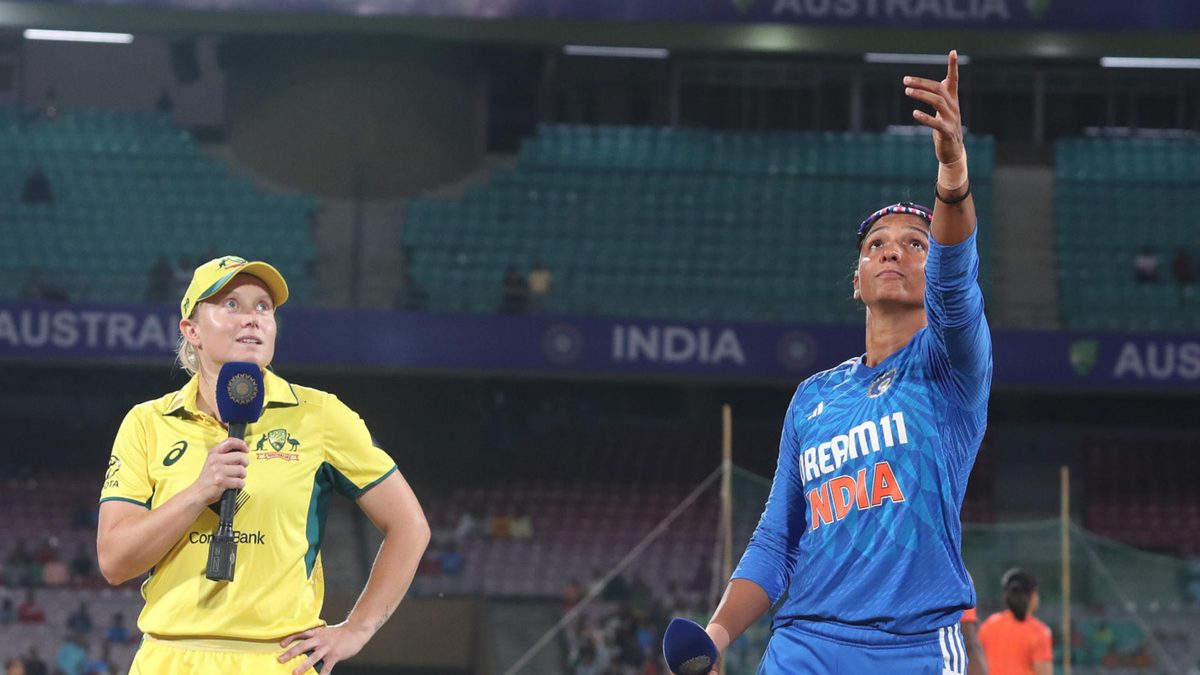 Alyssa Healy (c) of Australia and Harmanpreet Kaur (C) of India at the toss during the Women's T20I match between India and Australia at DY Patil Stadium on January 9, 2024 in Navi Mumbai, India