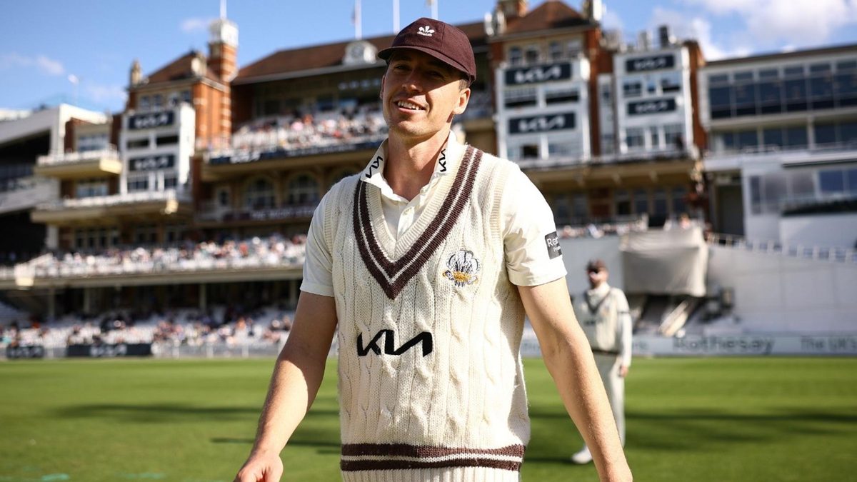 Matthew Fisher walks out to bowl at The Oval for Surrey